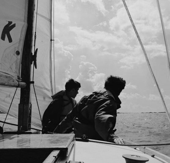two people on a boat
